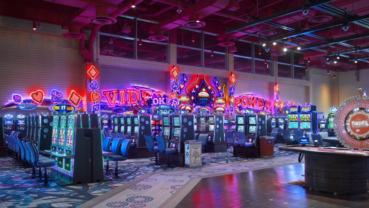 Casino floor featuring slot machines and gaming chair solutions